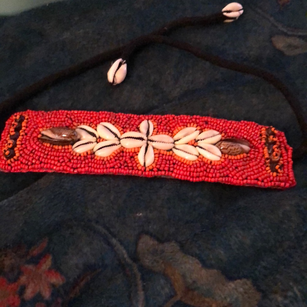 Beaded bracelet with string ties. New.